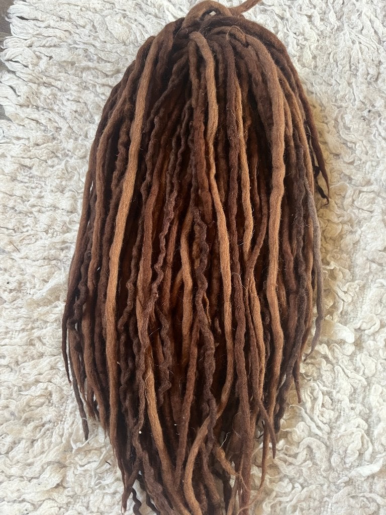 Super mooie wol dread set in verschillende bruin tinten 165€, Ophalen of Verzenden, Nieuw, Pruik of Haarverlenging