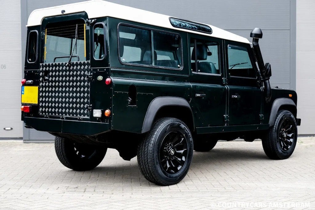 Land Rover Defender 2.5 110 Country, Auto's, Stof, Gebruikt, Zwart, 4 cilinders