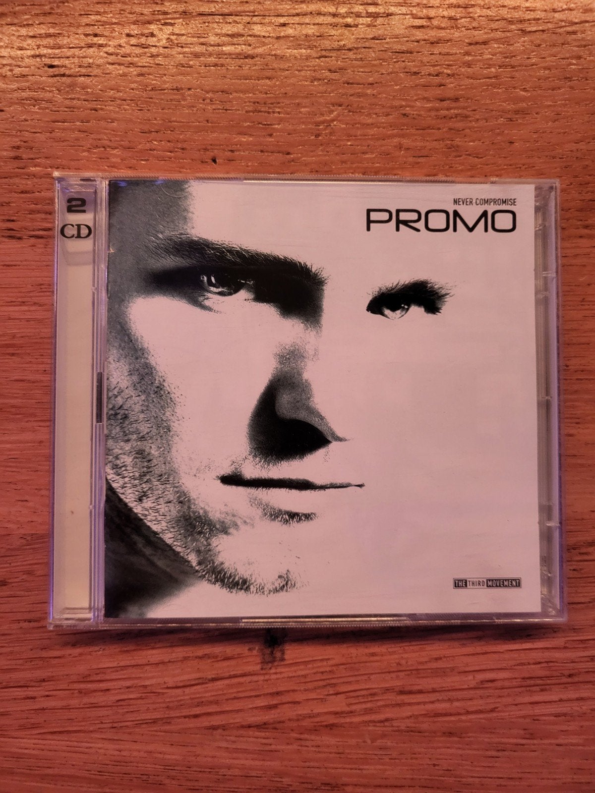 Promo - Never Compromise (2 CD), Gebruikt, Inclusief doosje, Ophalen of Verzenden, Elektronisch