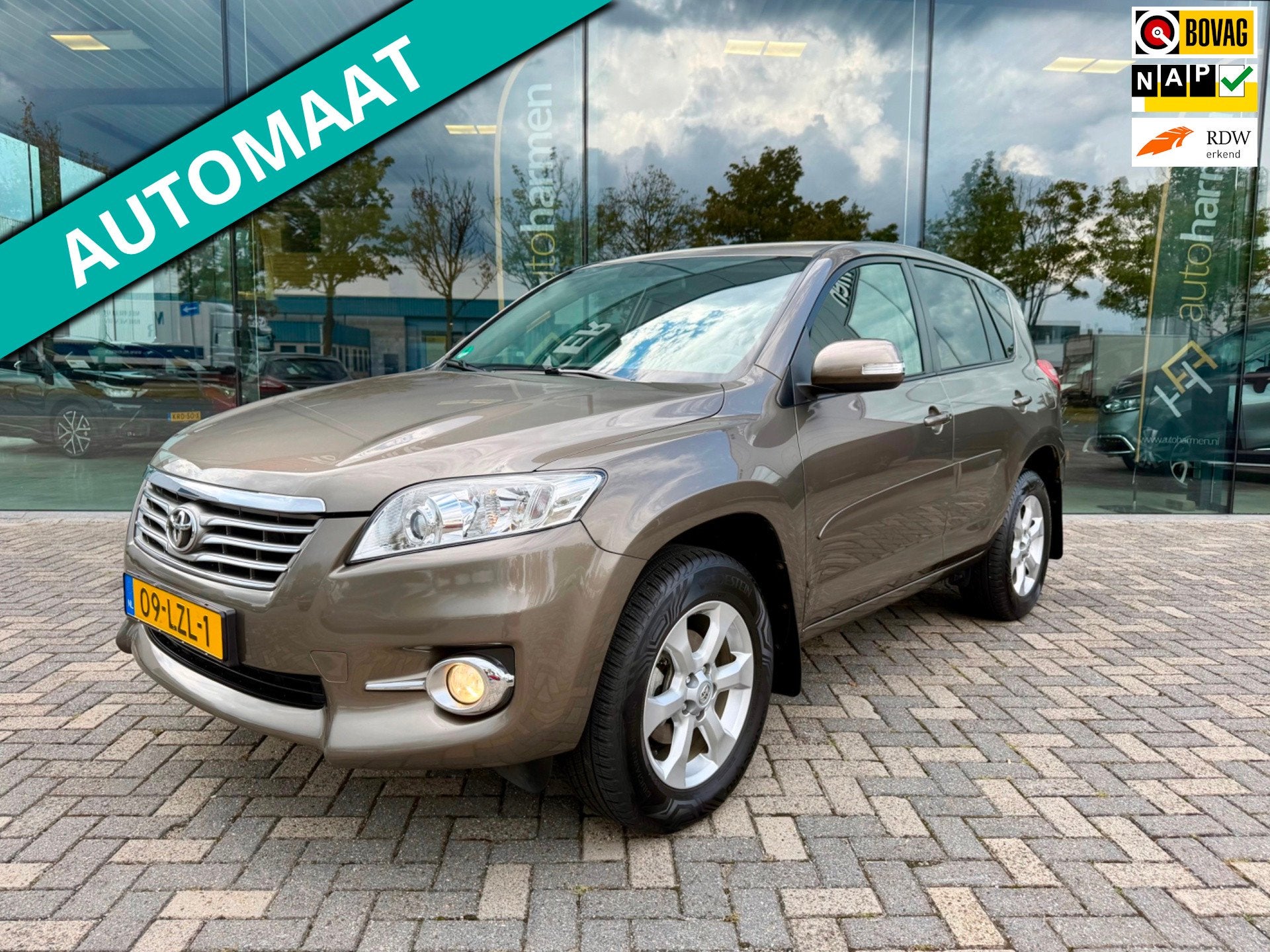 Toyota RAV4 2.0 VVTi automaat 4WD Executive Business, NAP, C, Gebruikt, Zwart, 4 cilinders, Bruin