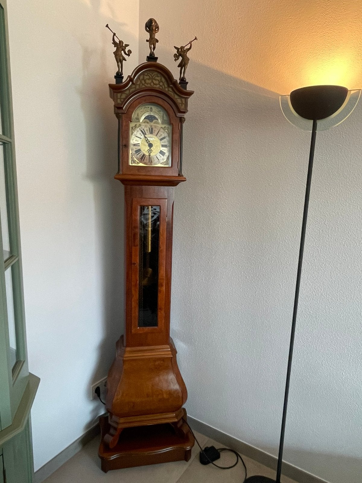 Notenhouten staande klok model 55430, Ophalen