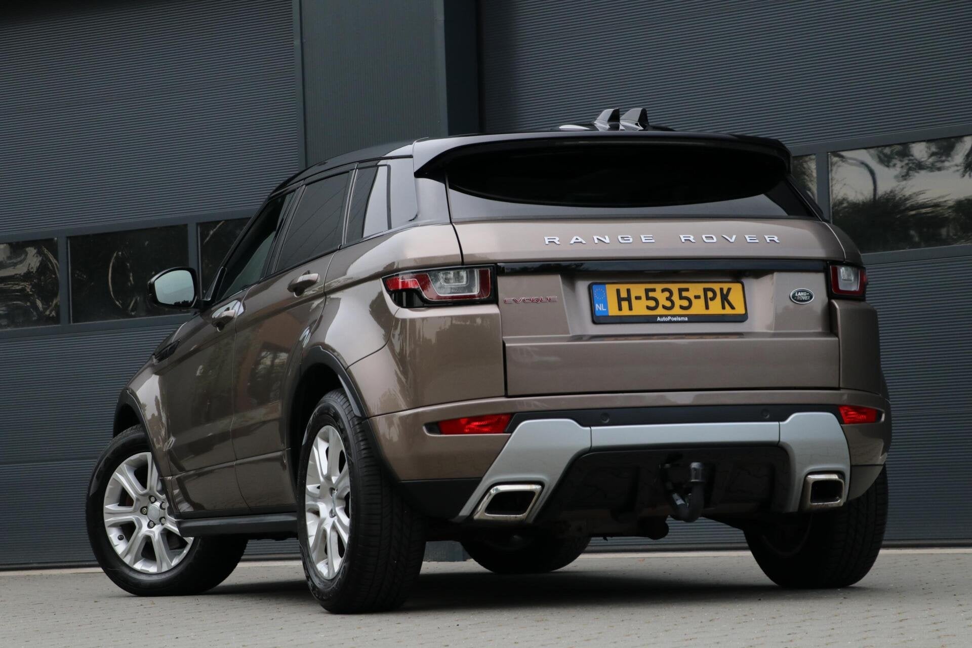 Land Rover Range Rover Evoque 2.0 Si4 HSE Dynamic 241PK Pano, 4 cilinders, Bruin, Bedrijf, Vierwielaandrijving