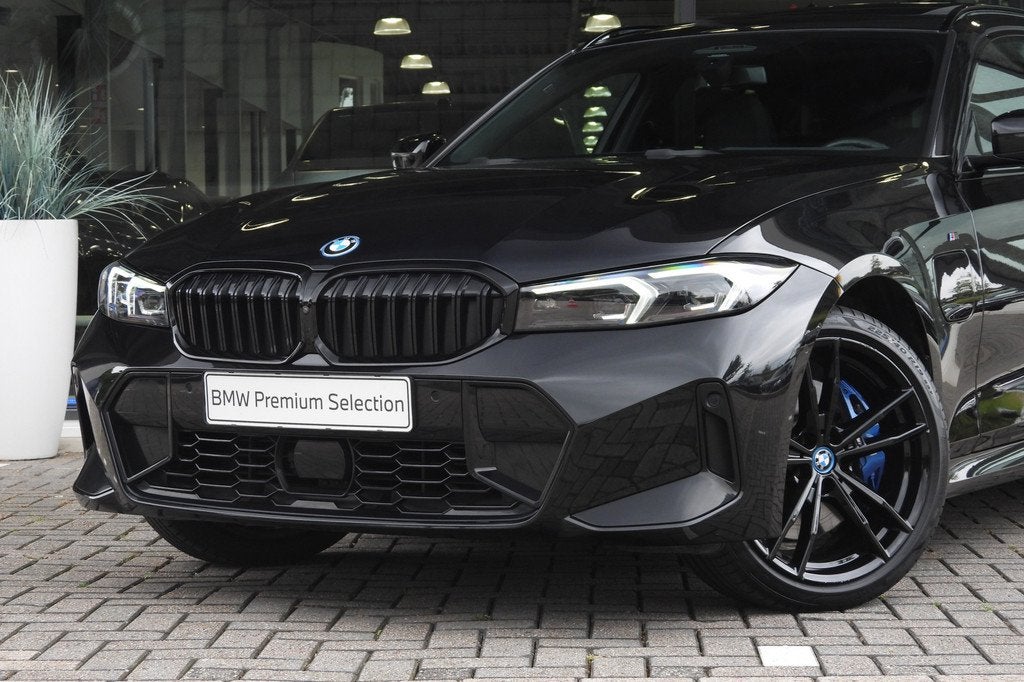 BMW 3 Serie Touring 330e M Sport Automaat / Panoramadak / Tr, Auto's, BMW, 1998 cc, Gebruikt, 4 cilinders, Met garantie (alle)