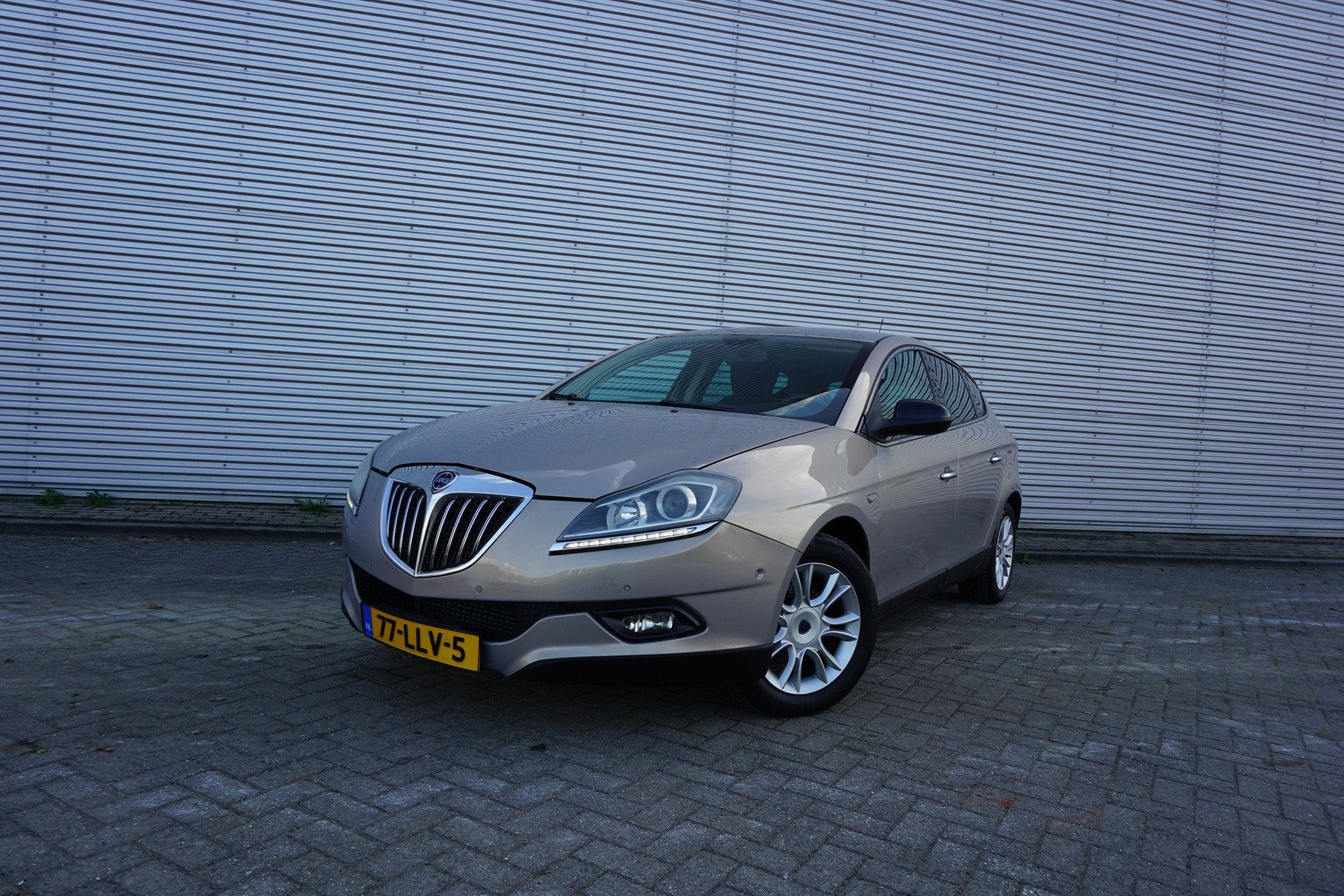 Lancia Delta 1.4-16V Oro Climate / Navi / Cruise / Parkeers, Auto's, Voorwielaandrijving, Parkeersensor, Gebruikt, 1295 kg