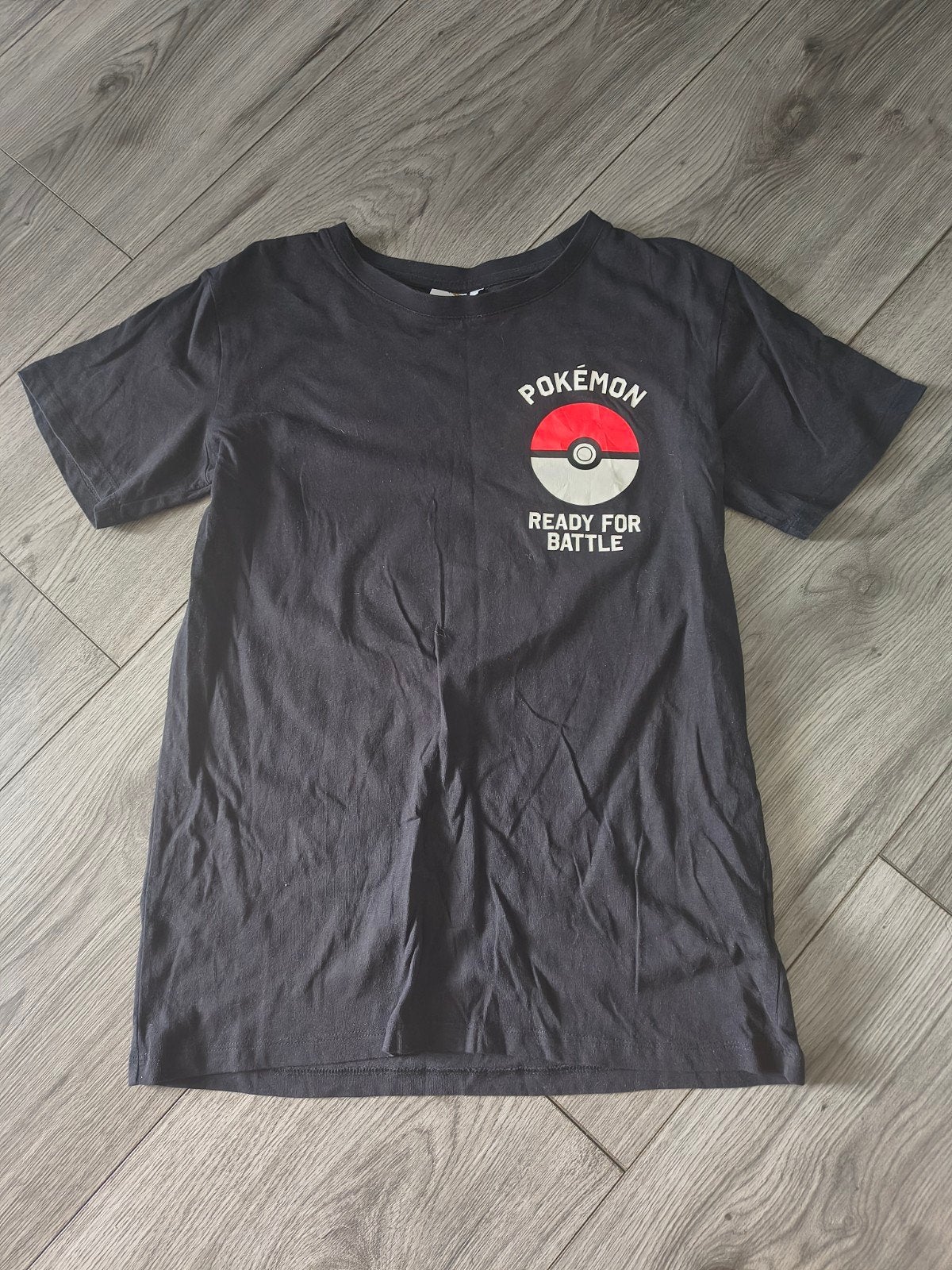 Zwart Pokémon T-shirt met Charizard print, Zwart, Overige maten, Ophalen of Verzenden, Zo goed als nieuw