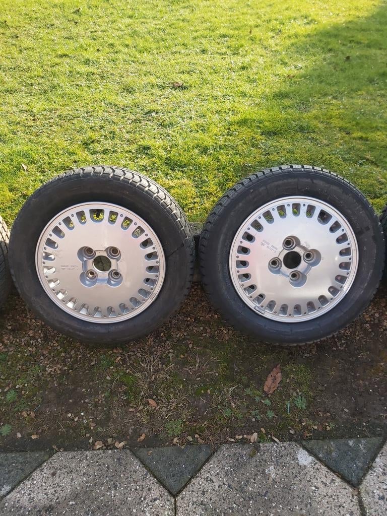Originele 15 inch lichtmetalen velgen Nissan Bluebird T12/72, Ophalen of Verzenden