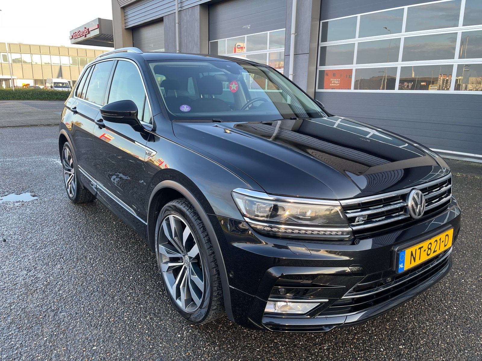 Volkswagen Tiguan 1.4 TSI 110KW/150PK 6DSG M16 2017 Zwart, Auto's, Volkswagen, 1800 kg, Zwart, 4 cilinders, Zwart