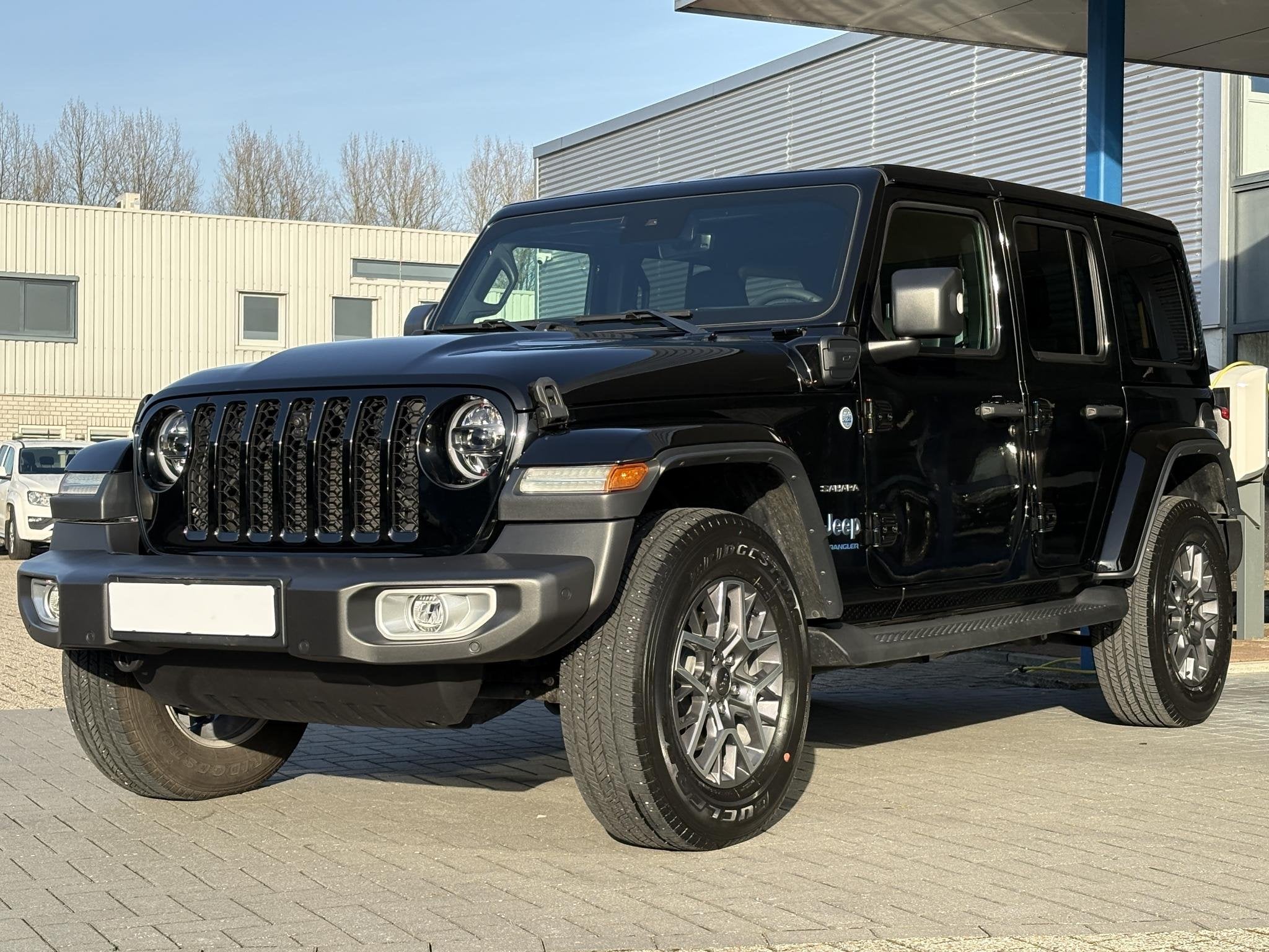 Jeep Wrangler Unlimited 4xe 380pk Sahara PHEV | Leder | Stoe, Auto's, Jeep, Automaat, Automatische klimaatregeling, Euro 6, 4 cilinders