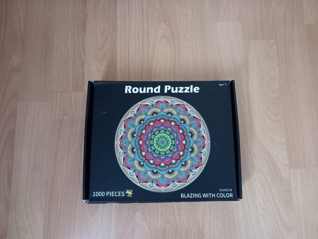 Ronde Puzzel Blazing Whit Color 1000 stukjes., Hobby en Vrije tijd, Ophalen of Verzenden, 500 t/m 1500 stukjes, Zo goed als nieuw