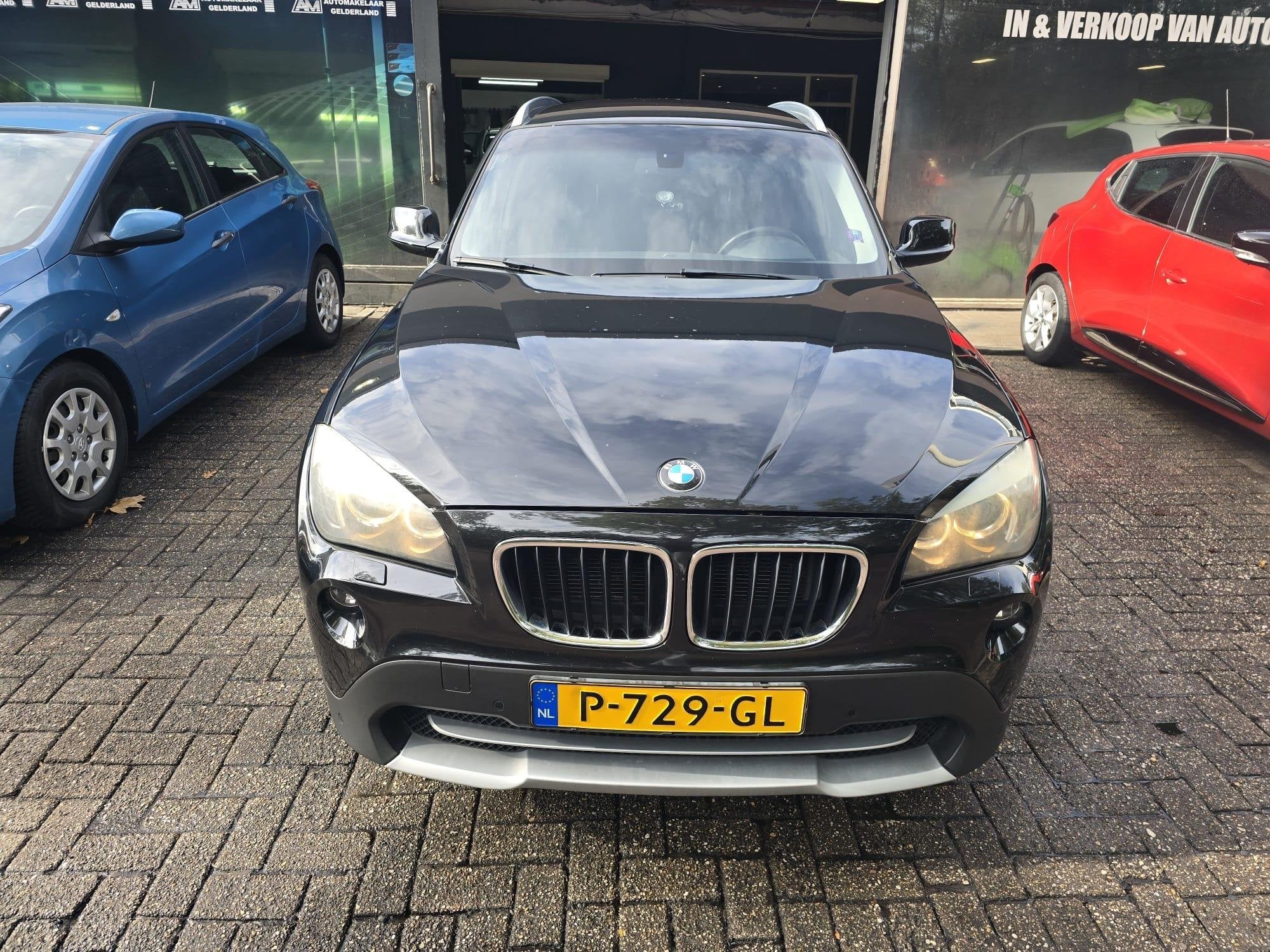 BMW X1 xDrive20i Business, Auto's, Stof, Gebruikt, 4 cilinders, 2000 kg