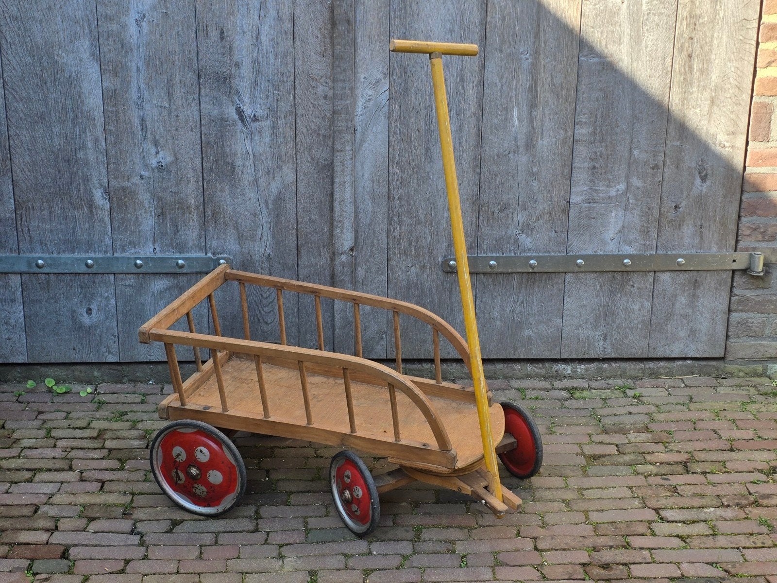Vintage houten bolderkar, Ophalen