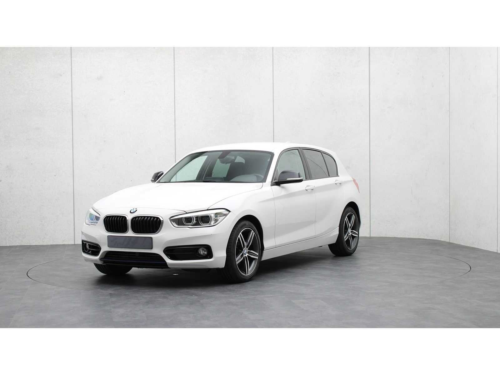 BMW - 1-serie - 118i EDE C. Sport - 2015 - HP-814-R - Person, Auto's, Gebruikt, Wit, Origineel Nederlands, 650 kg
