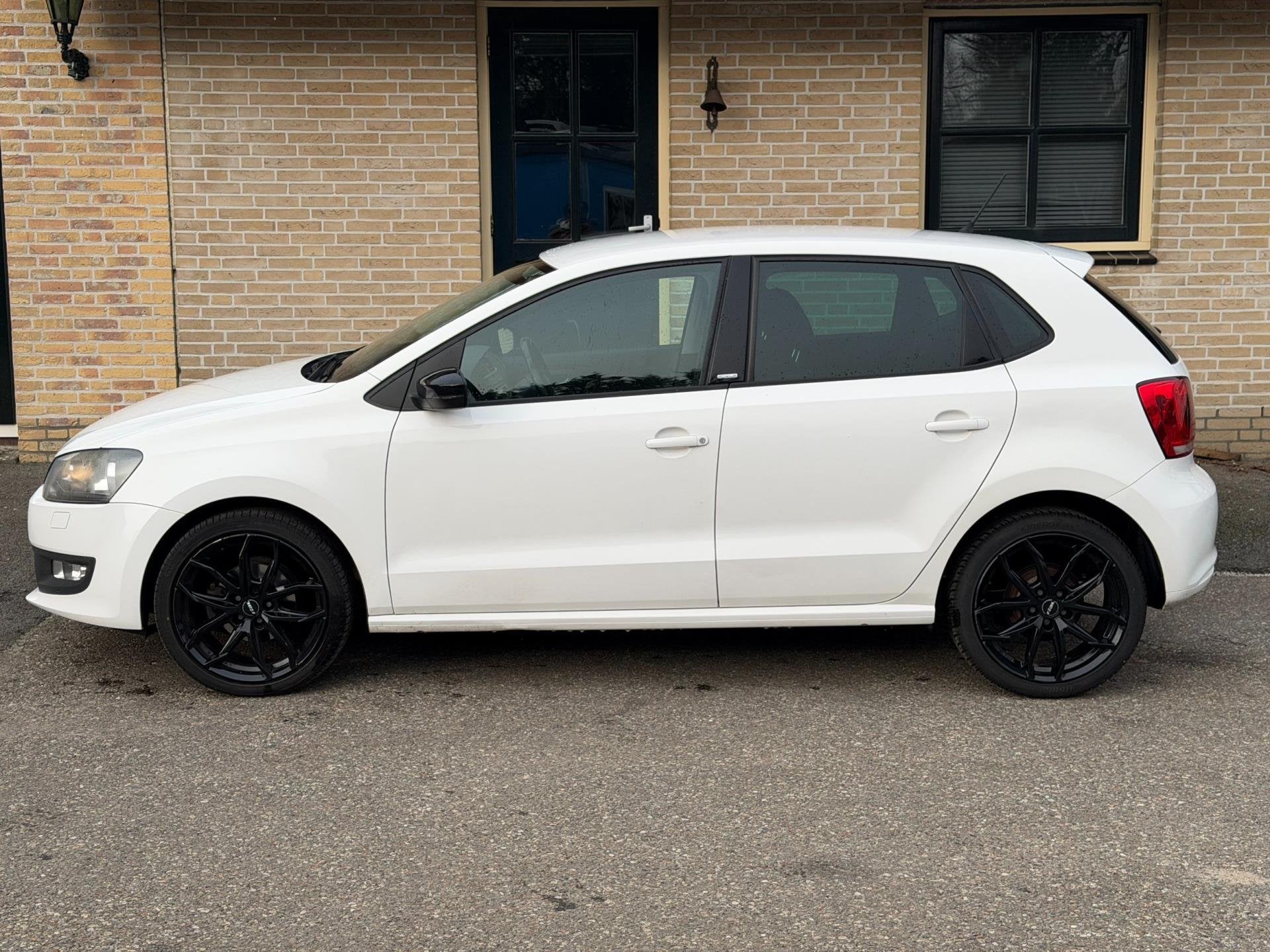 Volkswagen Polo 1.2-12V Style | NAVI | STOELVERWARMING, Auto's, Voorwielaandrijving, Euro 5, Zwart, 1198 cc