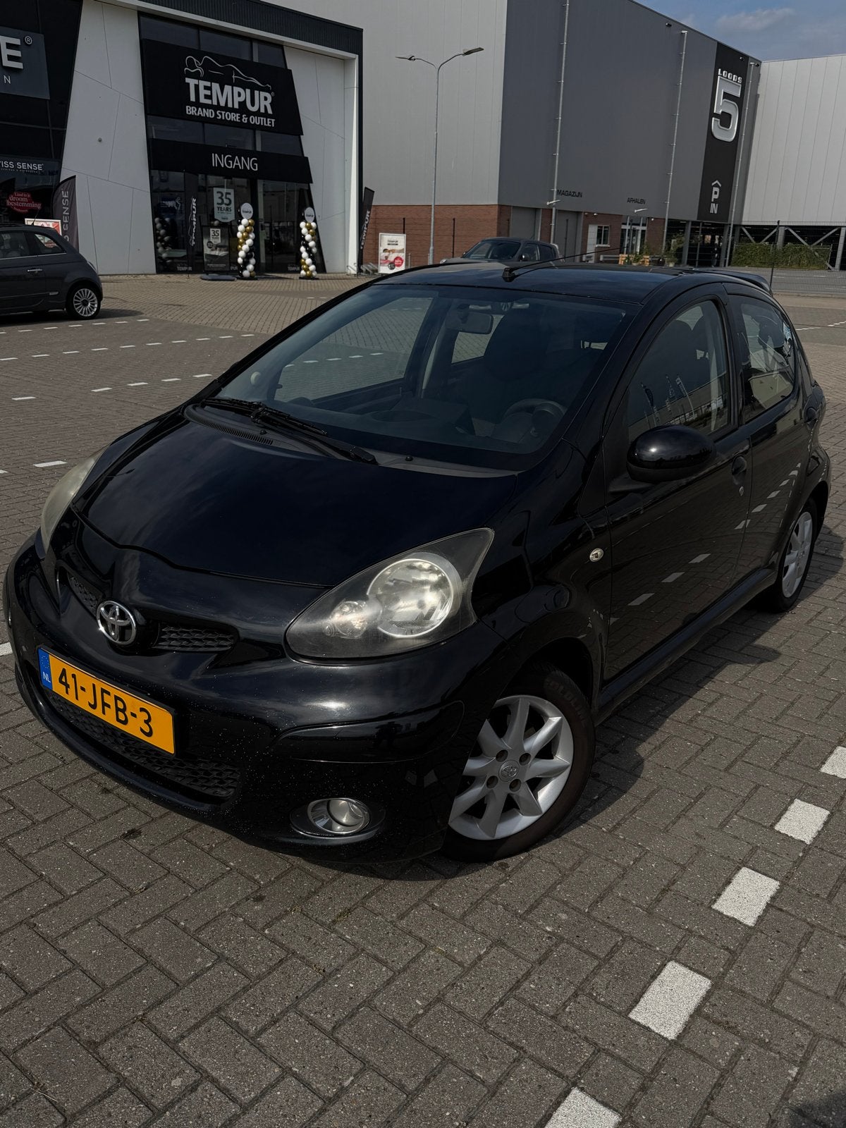 Toyota Aygo 1.0 12V Vvt-i 5DRS 2009 Zwart, Auto's, Toyota, Voorwielaandrijving, 4 stoelen, Origineel Nederlands, Handgeschakeld
