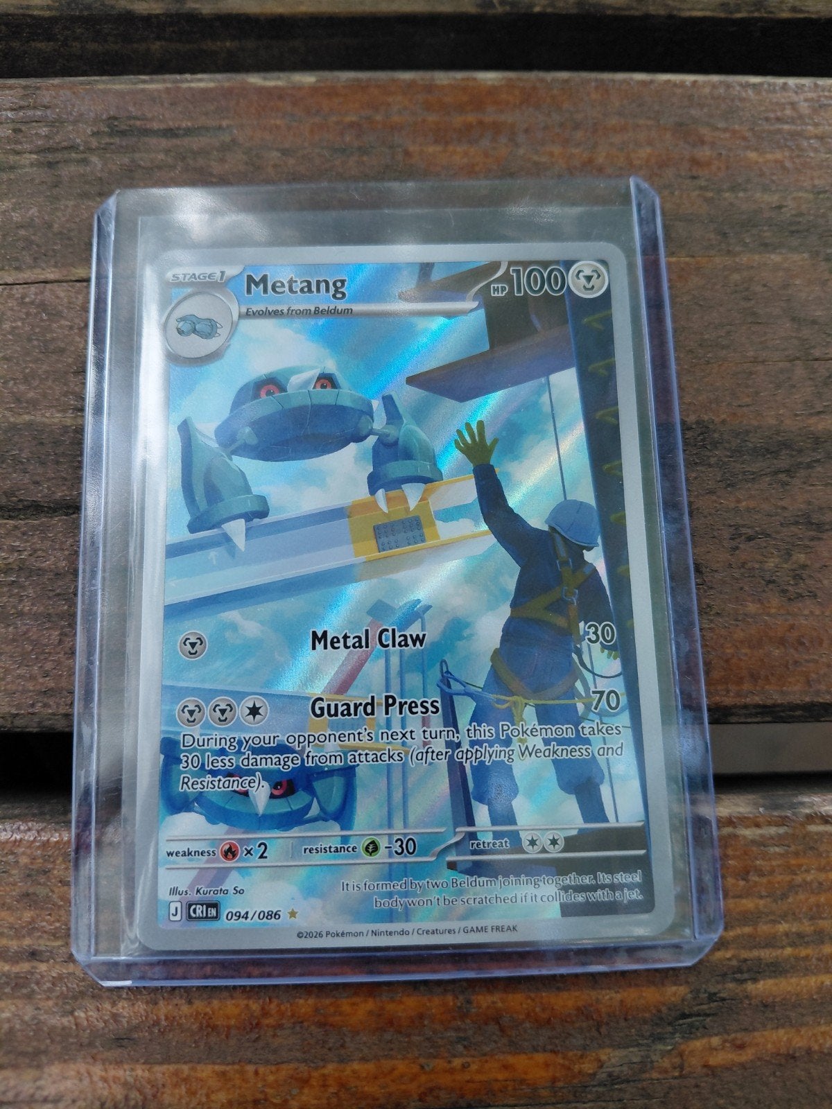 Metang Pokémon kaart (094/086) met harde sleeve, Ophalen of Verzenden, Zo goed als nieuw, Losse kaart, Foil