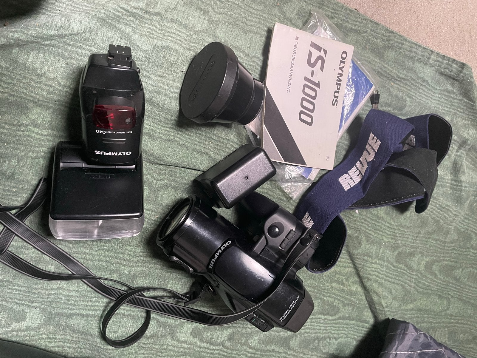 Olympus IS1000 analoge spiegelreflexcamera met toebehoren, Audio, Tv en Foto, Fotocamera's Analoog, Ophalen of Verzenden, Gebruikt