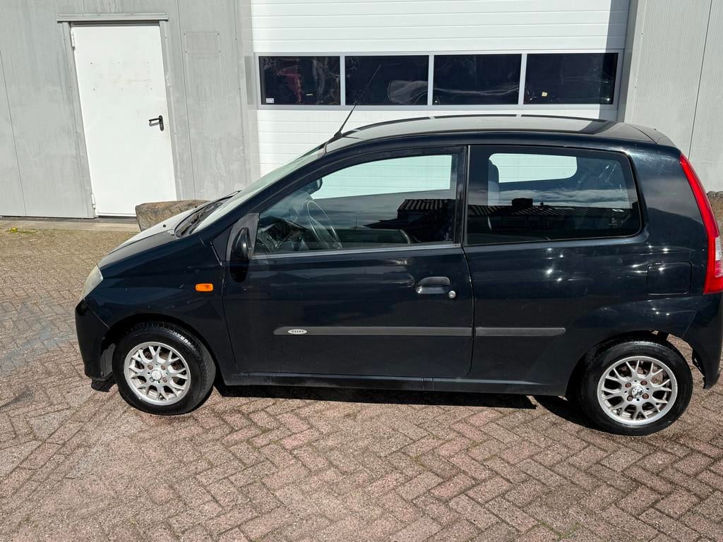 Daihatsu Cuore 1.0-12V Tokyo, Auto's, Airbags, 18 €/maand, 4 stoelen, Cuore
