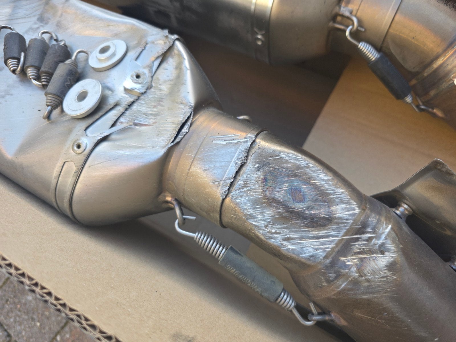 Akrapovic demper set ( 1 met schade) Aprilia RSV/Tuono Gen2, Ophalen of Verzenden, Gebruikt