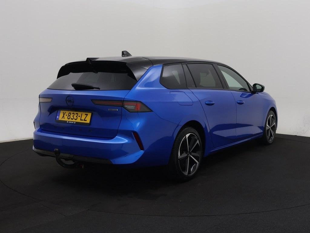 Opel Astra Sports Tourer 1.6 Turbo Plug In Hybrid GS Trekhaa, Auto's, Dealer onderhouden, 77 km/l, Gebruikt, Euro 6