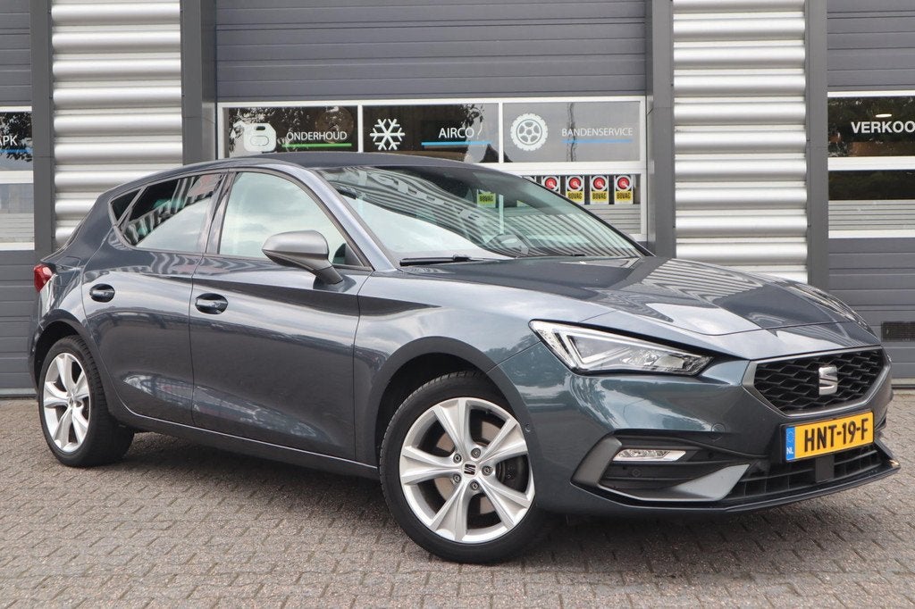 Seat Leon Sportstourer 1.4 TSI eHybrid PHEV FR Business Inte, Auto's, Seat, Gebruikt, Euro 6, 4 cilinders, 150 pk