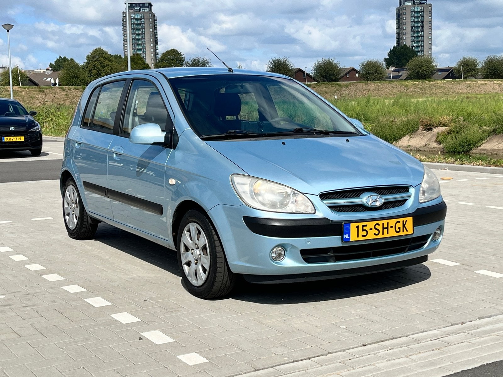 Hyundai Getz 1.4 Benzine 2006 Blauw, Auto's, Voorwielaandrijving, 40 €/maand, Zwart, 4 cilinders