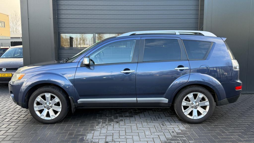 Mitsubishi Outlander 2.4 Instyle Airco|Dakje|Keyles|Leder|4W, Auto's, Automaat, 4 cilinders, Blauw, 7 stoelen