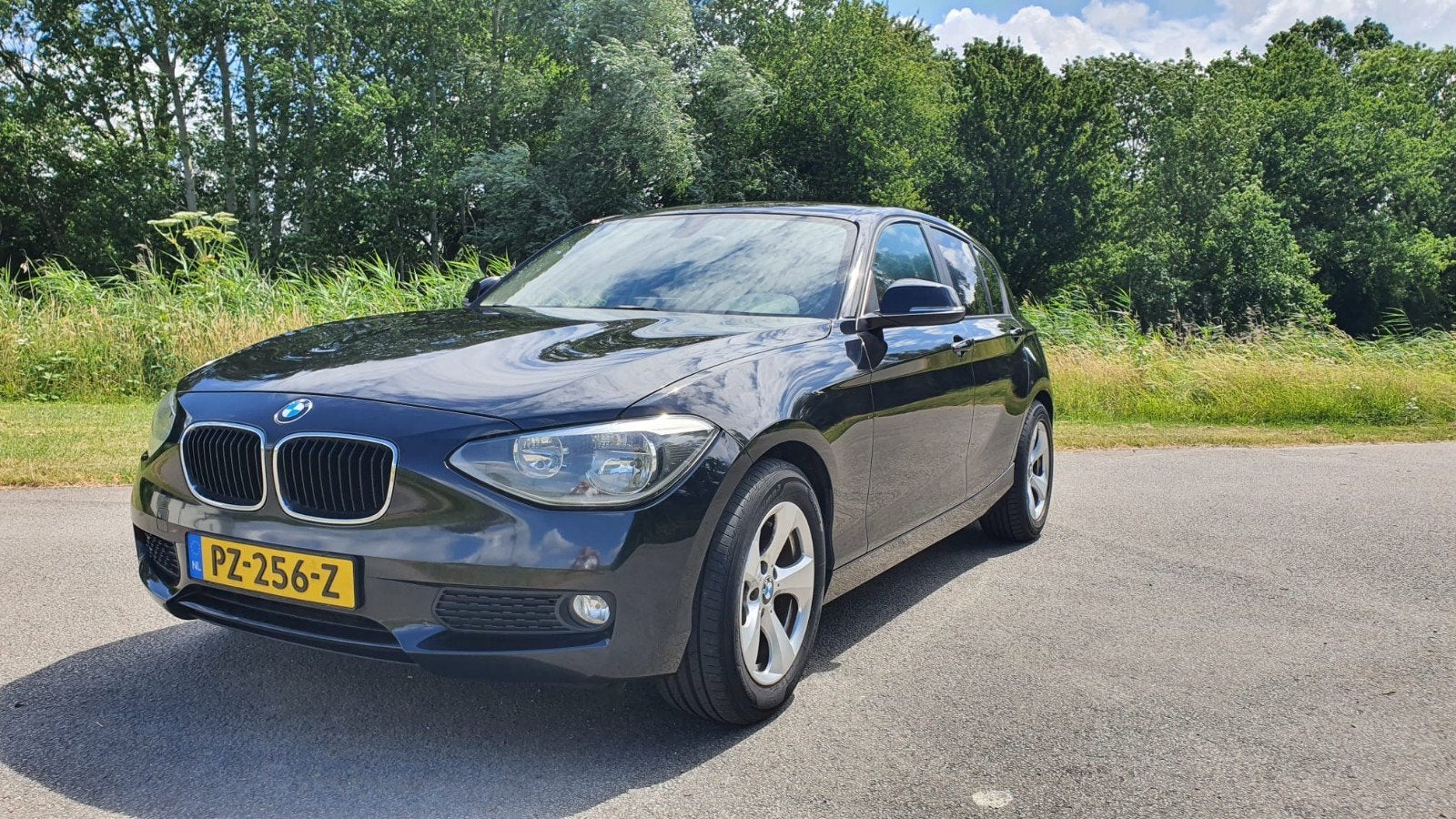 BMW 1-Serie 2.0 118D 5DR AUT 2012 Zwart, Auto's, BMW, Euro 5, Beige, 4 cilinders, Leder