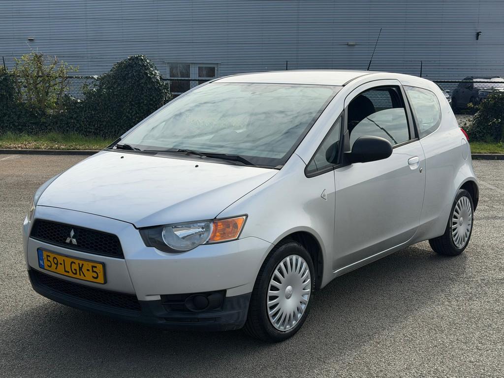 Mitsubishi Colt 1.1 Edition One / Airco - Nieuwe APK, Stof, Gebruikt, Colt, Origineel Nederlands
