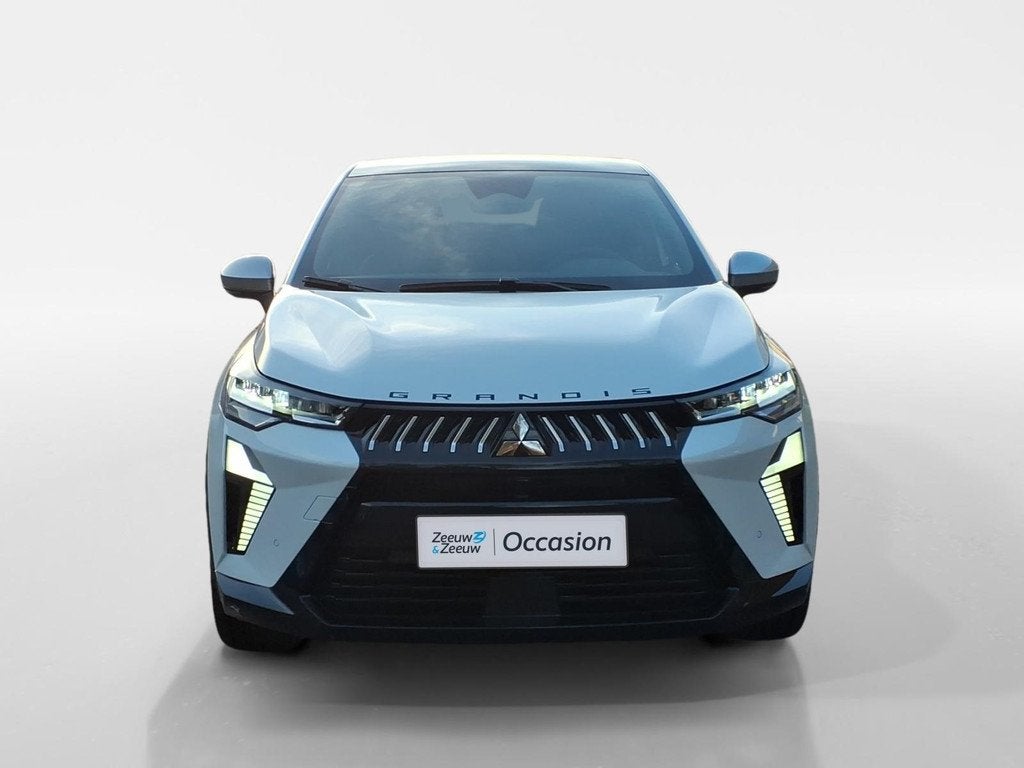 Mitsubishi Grandis 1.8 HEV Instyle Demo auto | meest complet, Auto's, Mitsubishi, 12 maanden, 730 kg, 1789 cc, Wit