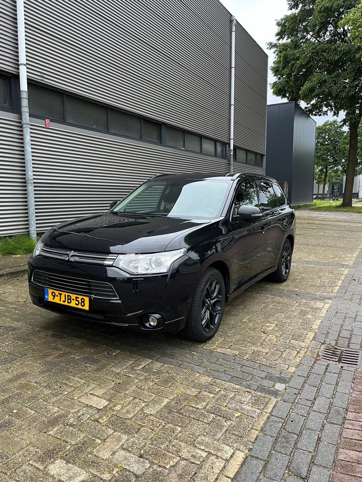 Mitsubishi Outlander 2.0 Dohc Mivec Phev 203pk 4WD CVT 5P, Auto's, 1998 cc, Outlander, 4 cilinders, Zwart