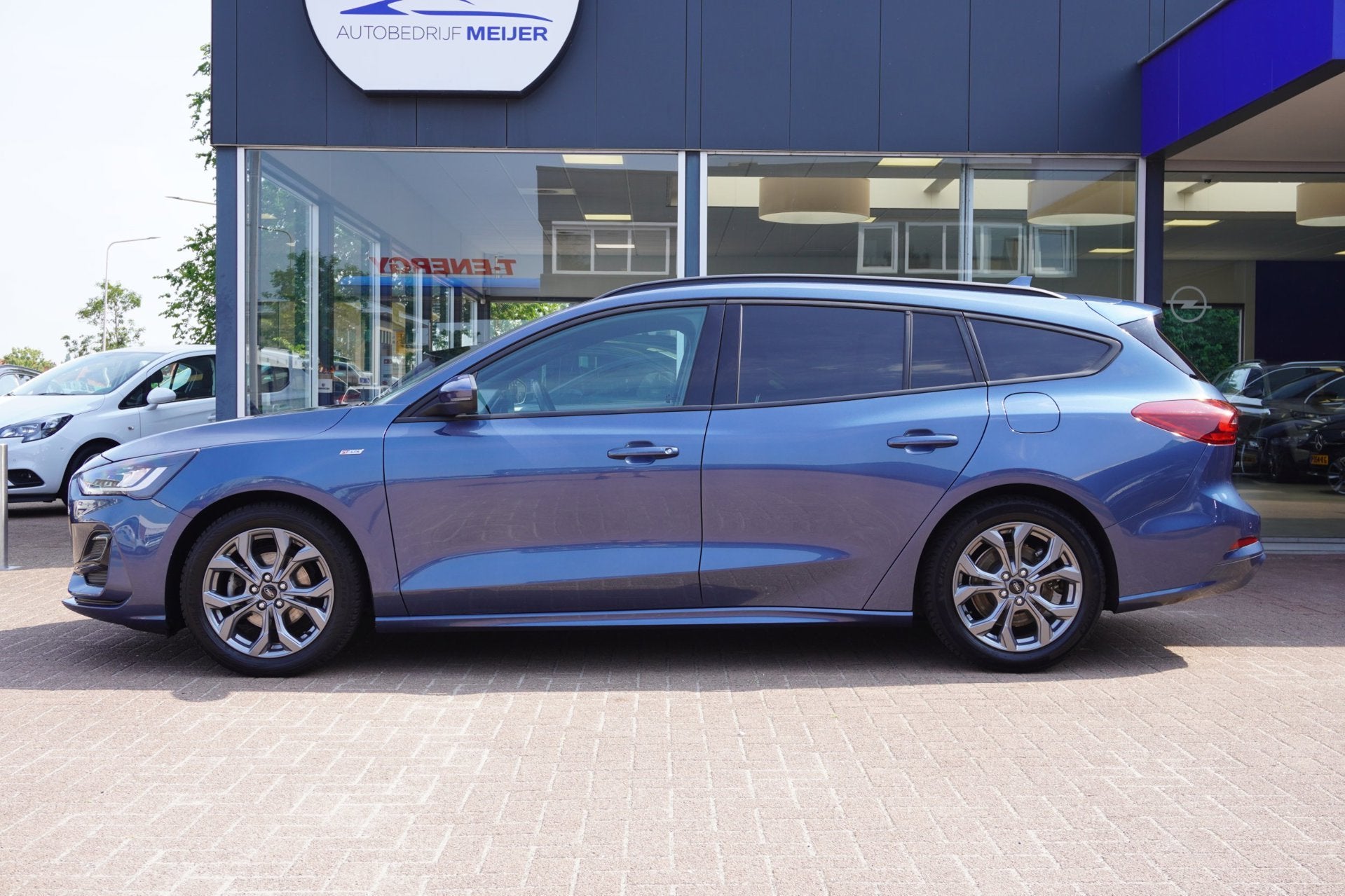 Ford Focus Wagon 1.0 EcoBoost Hybrid ST Line Airco | Navigat, Gebruikt, Blauw, Origineel Nederlands, Handgeschakeld