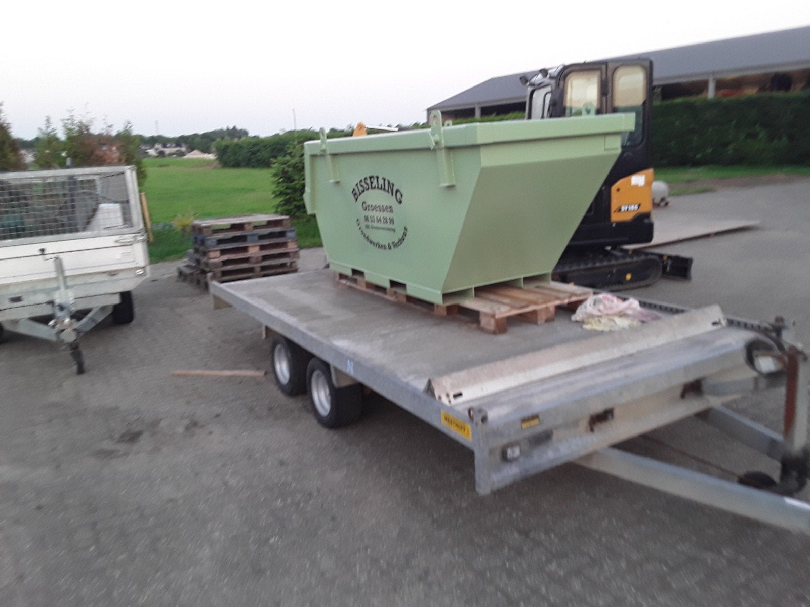 Containerbak portaalbak, Ophalen