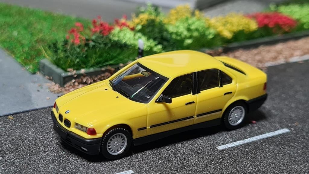 022 Herpa BMW 325i  Geel, Ophalen of Verzenden, Nieuw, Auto, Herpa