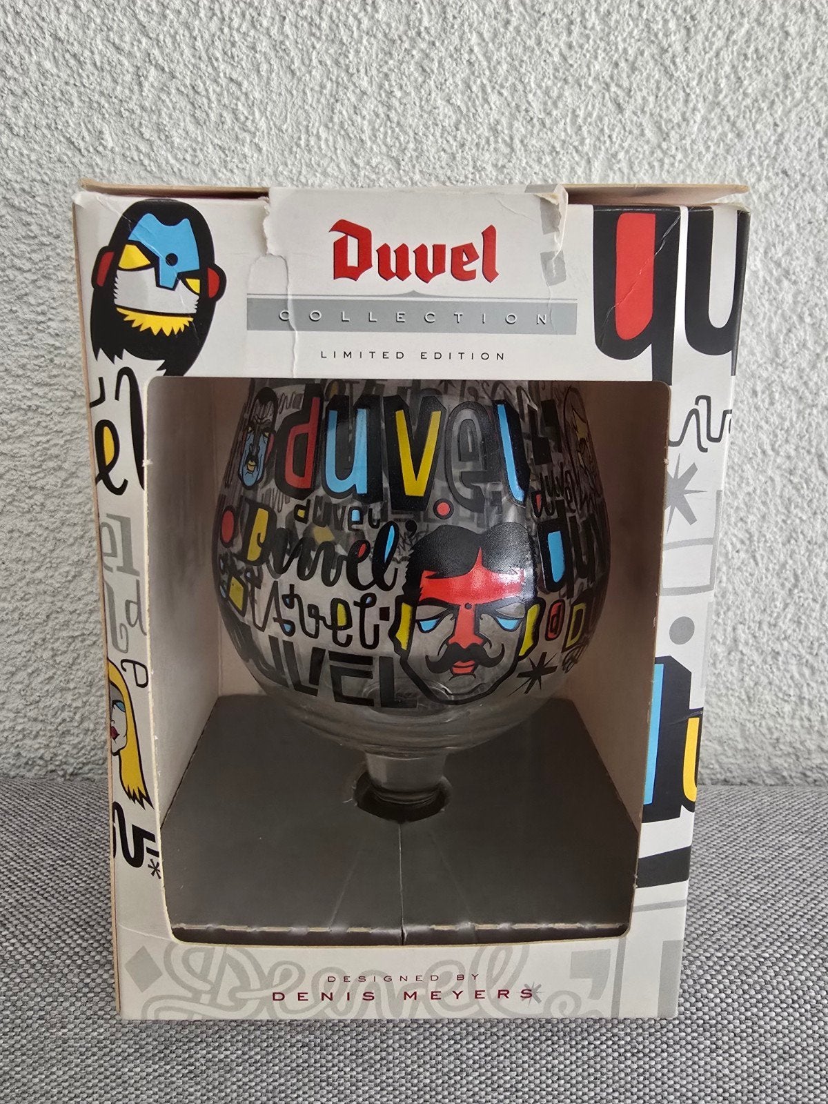 Duvel glas Denis Meyers 2010 Heldere E, Ophalen of Verzenden, Zo goed als nieuw, Glas of Glazen, Duvel
