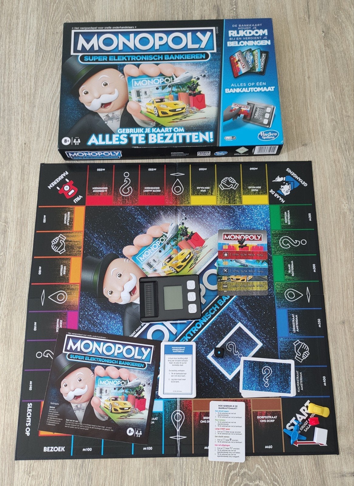 MONOPOLY SUPER ELEKTRONISCH BANKIEREN in NIEUWSTAAT, Hobby en Vrije tijd, Gezelschapsspellen | Bordspellen, Ophalen of Verzenden