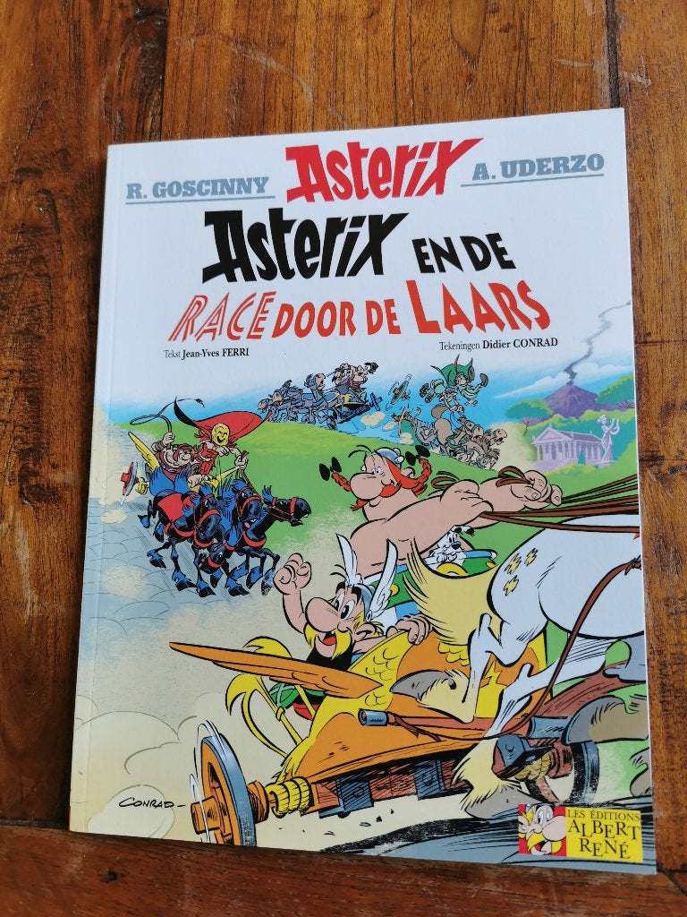 Asterix en de race door de laars, J. Ferri. en D. Conrad., Eén stripboek, Ophalen of Verzenden, Zo goed als nieuw, Jean-Yves Ferri en Didier Conrad