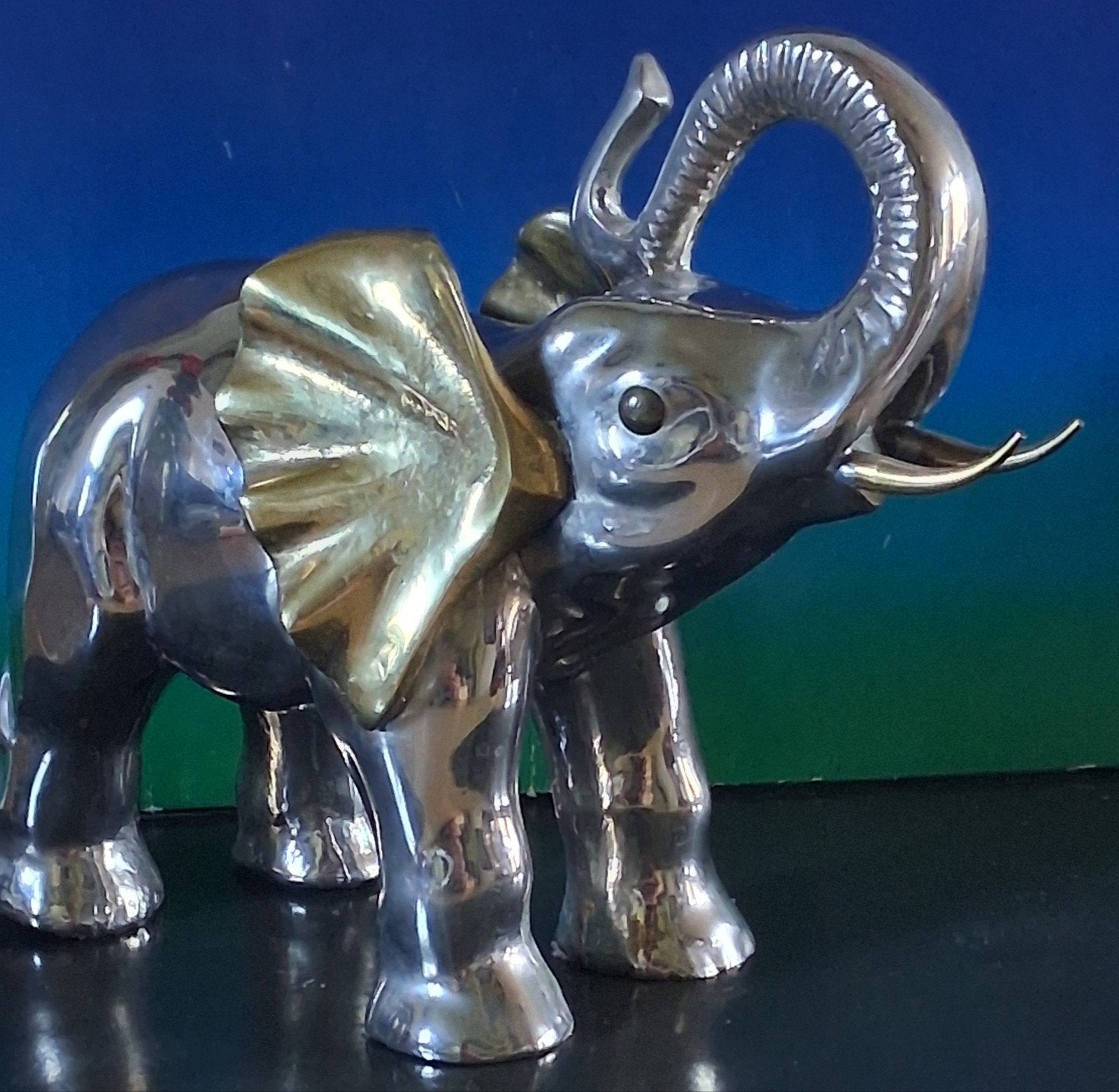 Olifant.  Verchroomd/messing. 18/14 cm., Ophalen