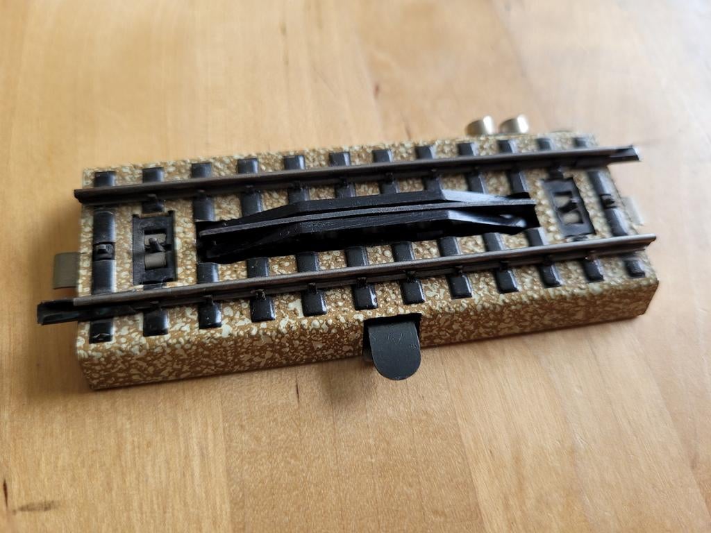 Märklin ontkoppelstukje 10 x 4 cm marklin 5112 germany west, Hobby en Vrije tijd, Ophalen of Verzenden, Wisselstroom, Märklin