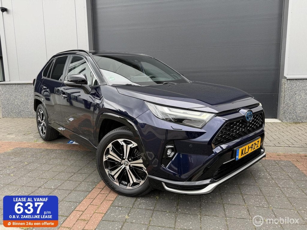 Toyota RAV4 2.5 Plug-in Hybrid AWD Bi-Tone Style Trekhaak, Auto's, Toyota, Bedrijf, Te koop, Rav4, 360° camera, 4x4, ABS, Achteruitrijcamera