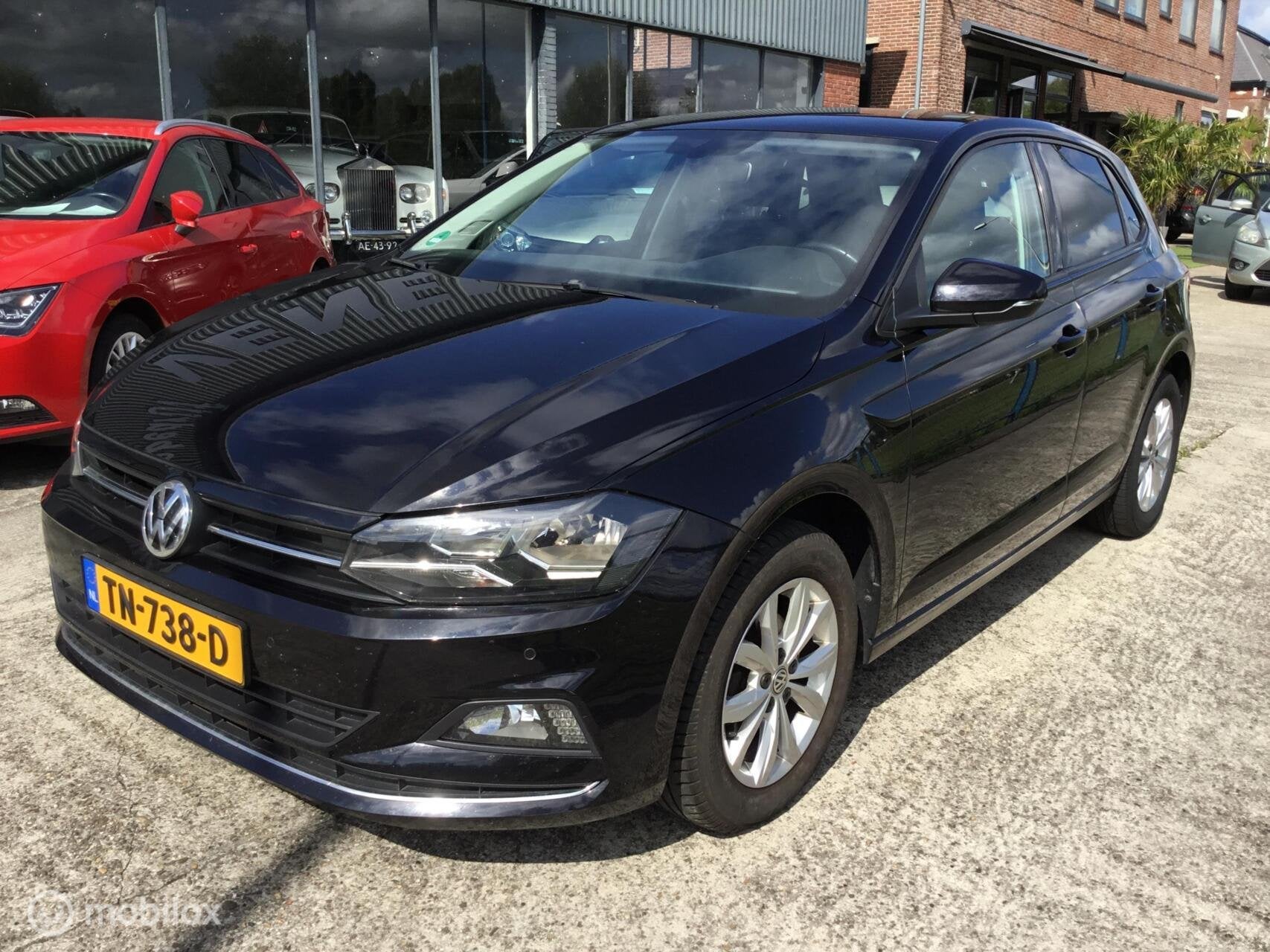 Volkswagen Polo 1.0 TSI Highline AUTOMAAT NW MODEL, Auto's, Gebruikt, Euro 6, 95 pk, Verwarmde buitenspiegels
