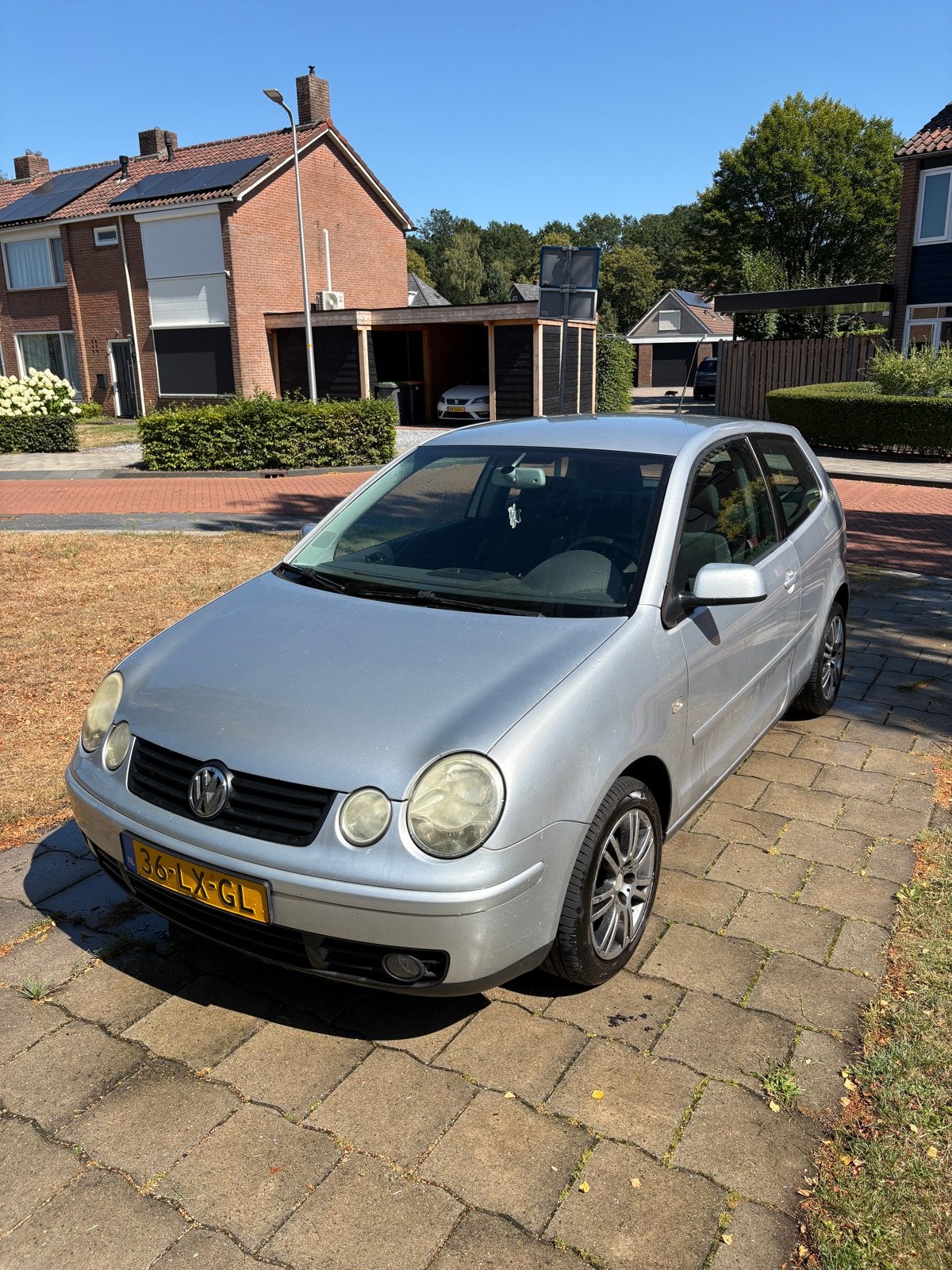 Volkswagen Polo 1.4 55KW 2003 Grijs, Auto's, Voorwielaandrijving, 4 cilinders, Origineel Nederlands, Handgeschakeld