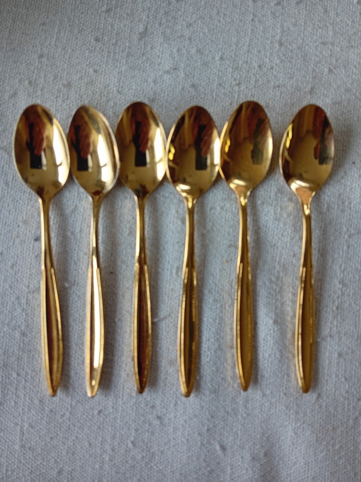 Set van 6 glanzend goudkleurige lepeltjes van van nelle, Antiek en Kunst, Antiek | Bestek, Ophalen of Verzenden