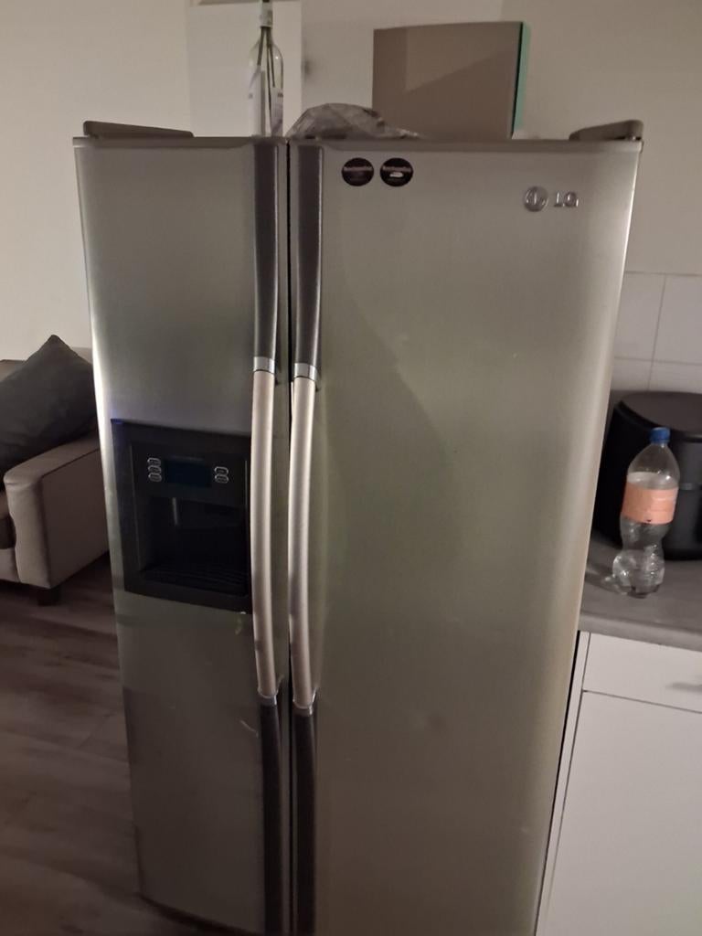 LG Amerikaanse koelkast met vriezer en waterdispenser, Ophalen, Gebruikt, 200 liter of meer, 60 cm of meer
