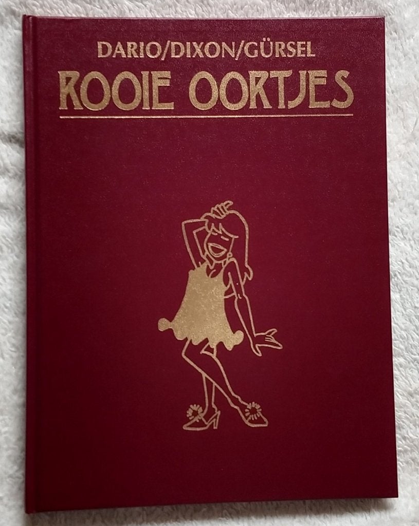 rooie oortjes hardcover, Dario Dixon Gürsel, volgnr 17, Boeken, Stripboeken, Eén stripboek, Ophalen of Verzenden, Zo goed als nieuw
