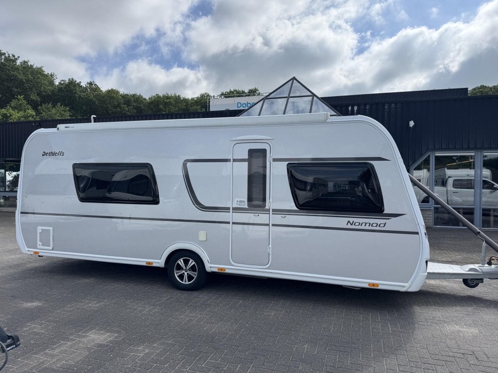 Dethleffs Nomad 560 RET | Airco, Oven, Casetteluifel etc., Caravans en Kamperen, Rondzit, Overige typen, Bedrijf, Dethleffs