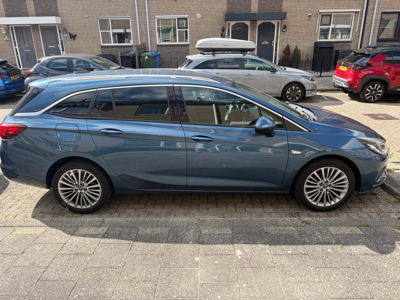 Opel Astra 1.0 Turbo 77KW Sports Tourer 2016 Blauw, Voorwielaandrijving, Zwart, 1178 kg, Blauw