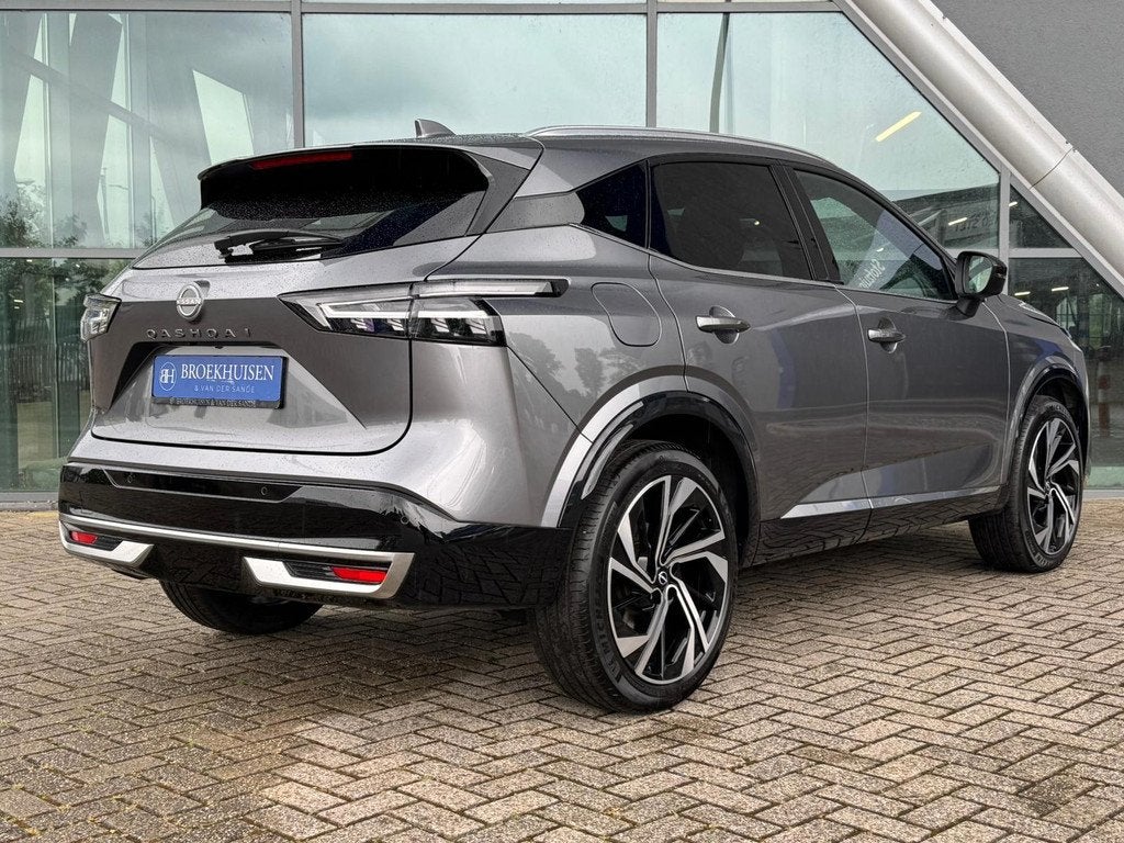 Nissan Qashqai 1.3 MHEV Xtronic Tekna Plus 158pk Massage sto, Auto's, Nissan, Zwart, 4 cilinders, Bedrijf, Hybride Elektrisch/Benzine