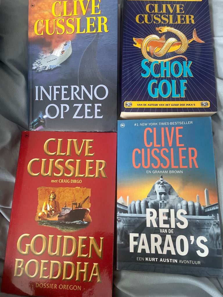 Clive Cussler Boeken: Inferno op Zee, Schokgolf, Gouden Boed, Boeken, Avontuur en Actie, Ophalen of Verzenden, Gelezen