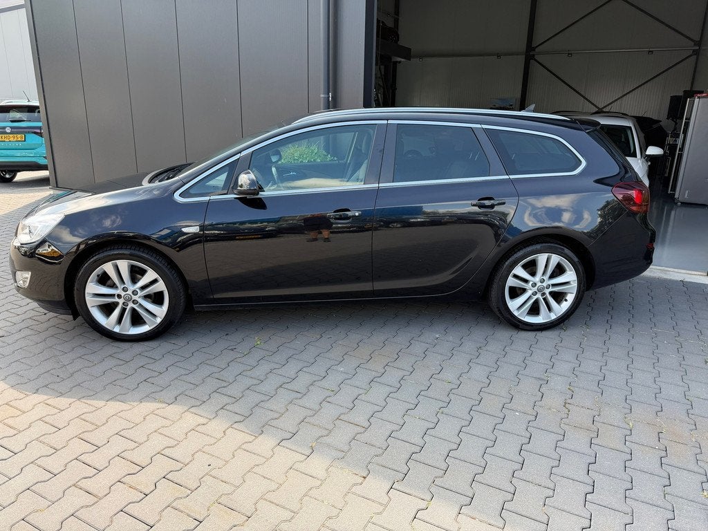 Opel Astra Sports Tourer 1.4 Turbo Cosmo, Voorwielaandrijving, Euro 5, Stof, Gebruikt