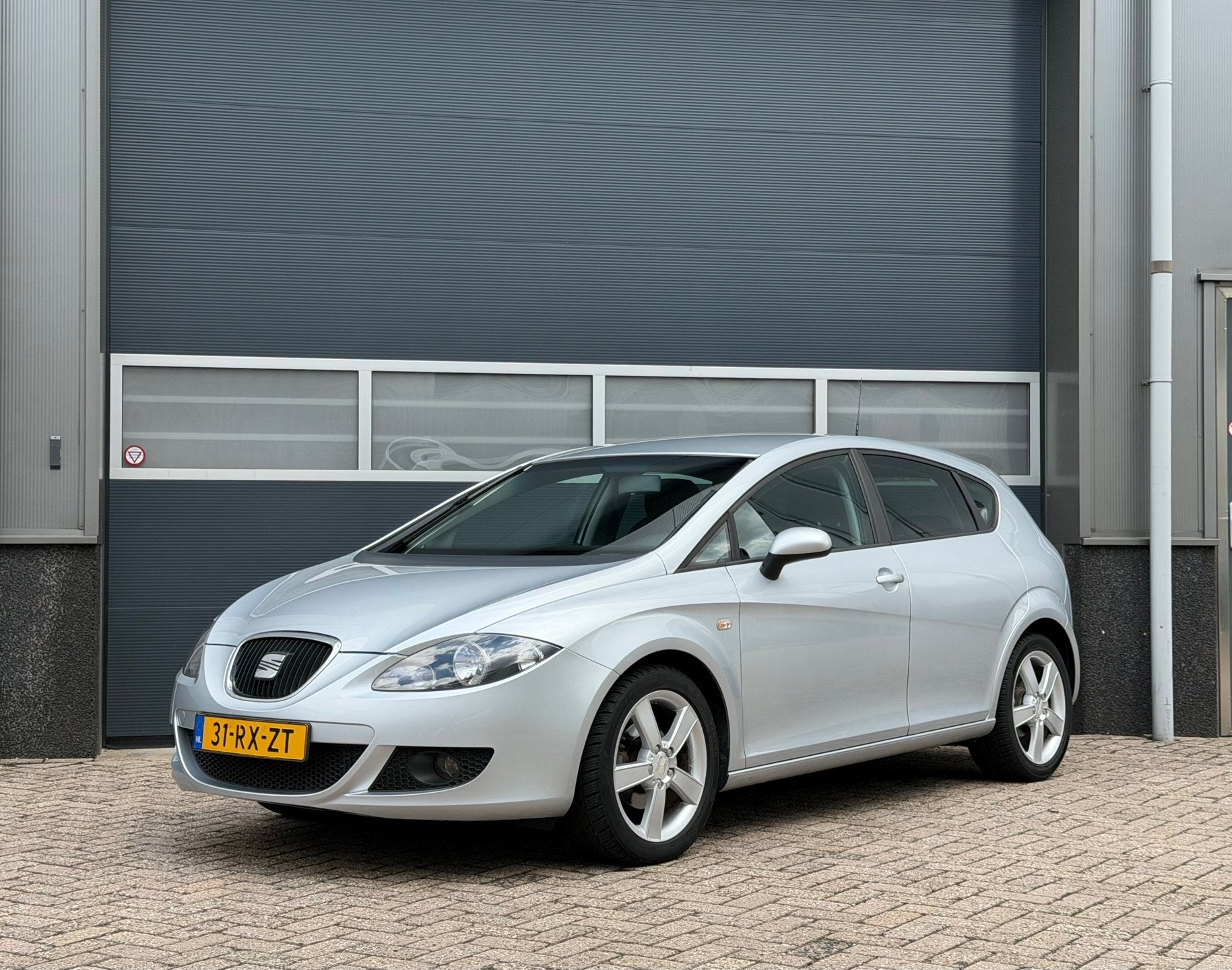 Seat Leon 1.6 Stylance bj.2006 Clima|Cc|Oh boekjes|Nap., Auto's, Stof, Gebruikt, 4 cilinders, Grijs